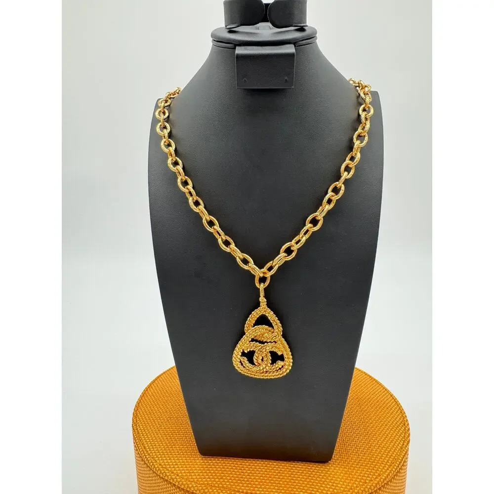 Vintage Chanel 93A Gold Tone Chain Rope Knot Pendant Necklace 1993